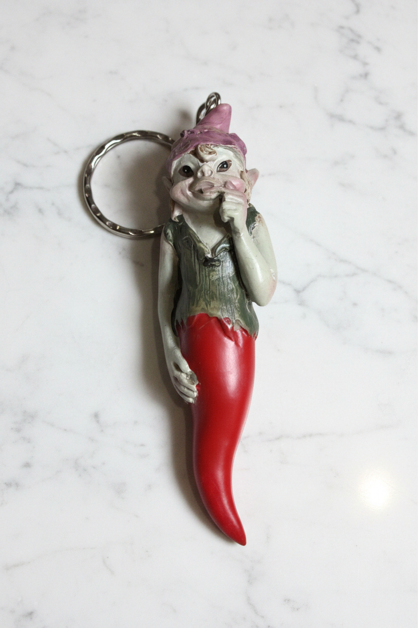 Pixie Dito in Bocca Corno - flatlay su marmo