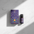 Olio fragranza Goloka Money Drawing - flatlay su marmo