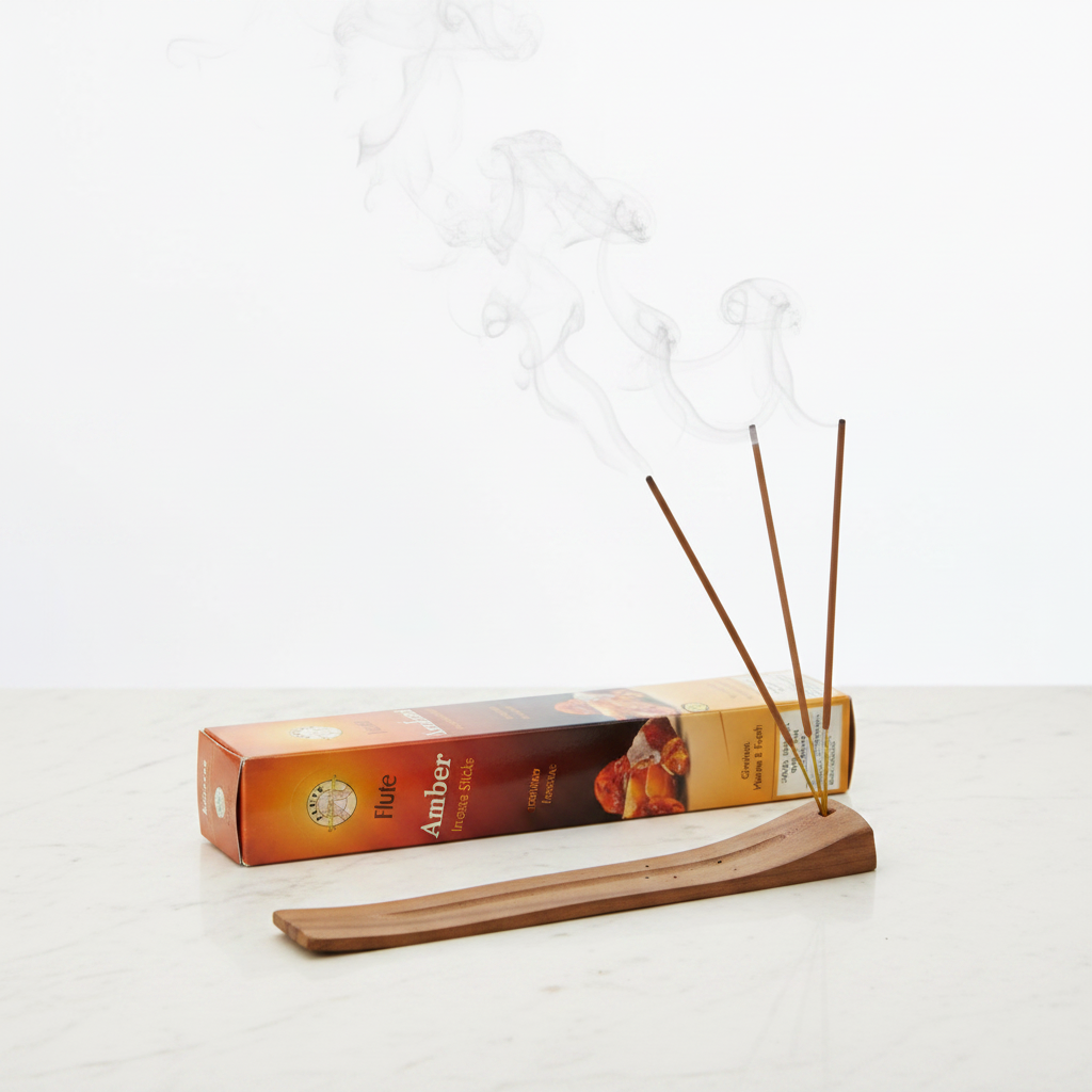 Flute Amber incensi in stick accesi con fumo