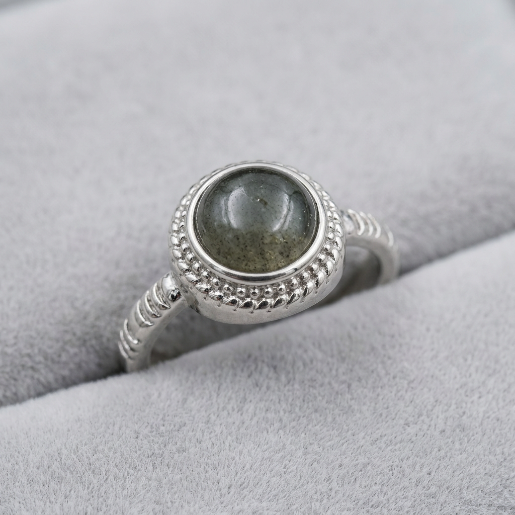 Anello 319 su velluto grigio