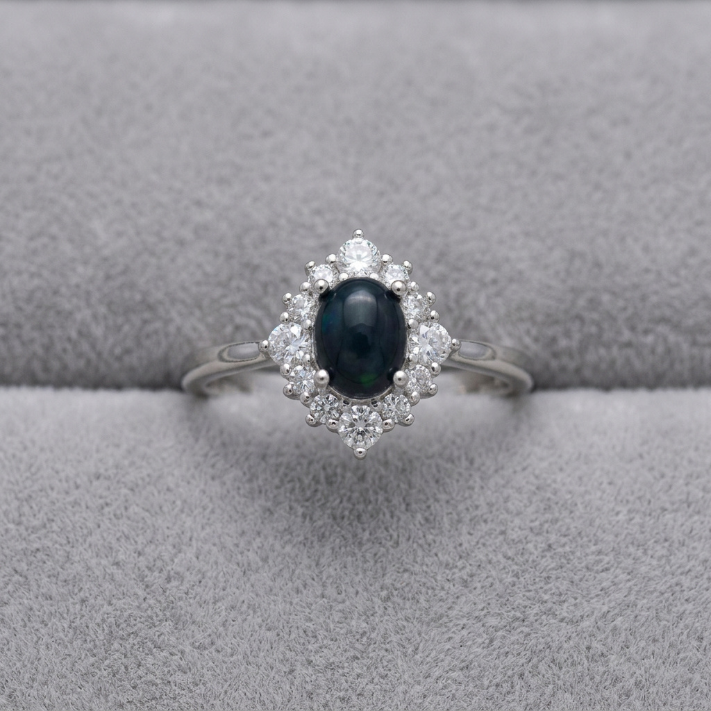 Anello 323 su velluto grigio