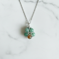 Collana Pentacolo Crisoprasio - flatlay su marmo