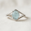 Anello 309 con acquamarina su lino avorio