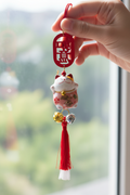 Maneki Neko Rosa Simbolo Cinese - in mano